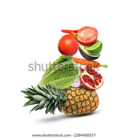 Stack of different vegetables and fruits isolated on white