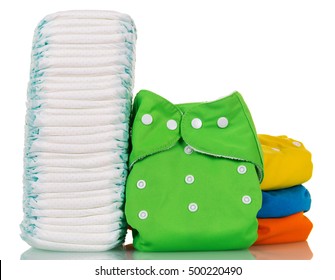 A Stack Of Disposable And Cloth Diapers Isolated On White Background.