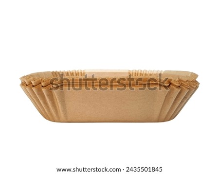 Stack of disposable wax paper for your fryer isolated on white background with clipping path. Air fryer paper liner, front view close up.