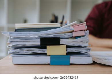 Stack of Documents with Binder Clips