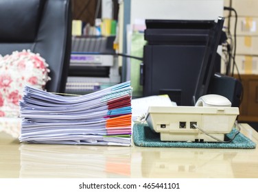 stack of documents or files in office desk