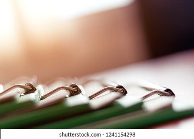 Stack of documents placed on a business desk in a business office.