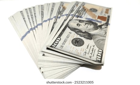 Stack of dollar bills scrolling. Banknotes, American dollars isolated on a white background, U.S. dollars. $100 bills

