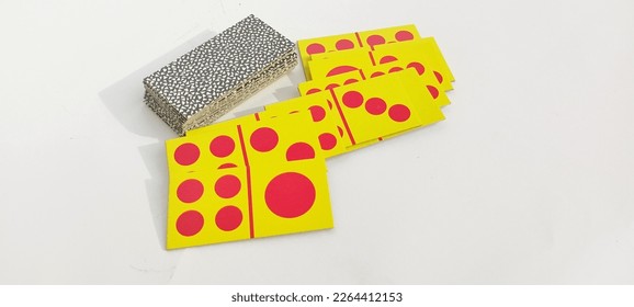 stack of dominoes on white background