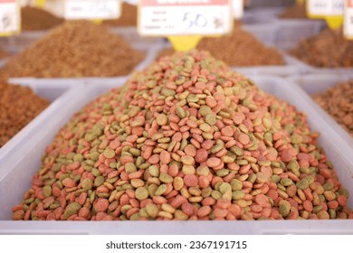 stack of dried cat food display for sale at local market  - Shutterstock ID 2367191715