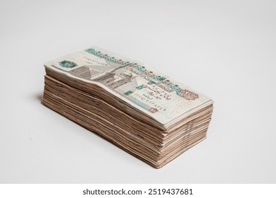 Stack of Egyptian 100 Pound Banknotes isolated in white Background