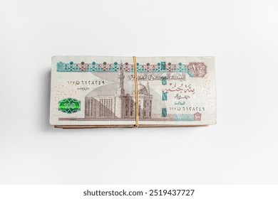 Stack of Egyptian 100 Pound Banknotes isolated in white Background