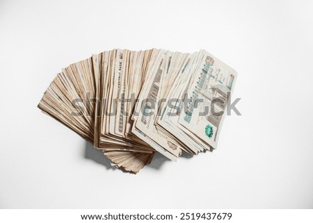 Stack of Egyptian 100 Pound Banknotes isolated in white Background