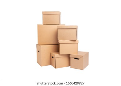Stack of empty cardboard boxes isolated on white background closeup.