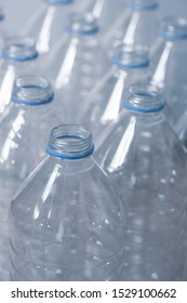 stack of empty water bottles