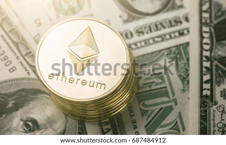 Stack of ethereum coins on dollar notes