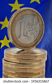 Stack Of Euro Coins On European Flag Background 