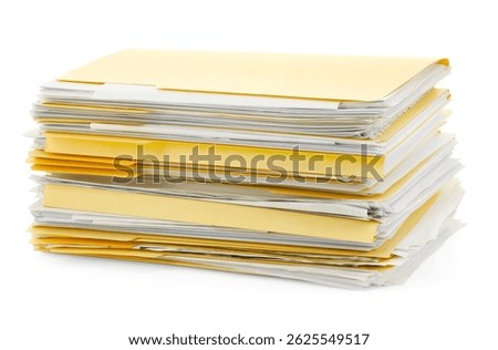 Stack of file folders with papers isolated on white