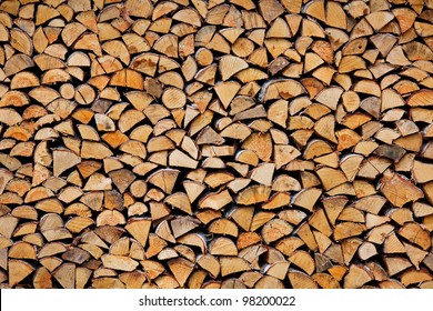 stack of firewood - Shutterstock ID 98200022