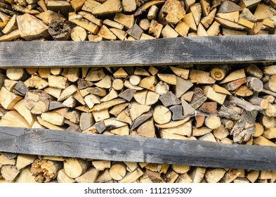 Stack of firewood. Copy space.