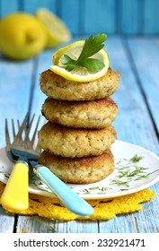 Stack Of Fish Cutlet On A White Plate.