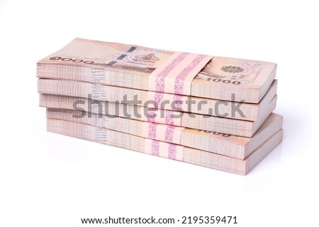 Stack of five hundred thousand thai baht banknote money isolated on white background with clipping path.