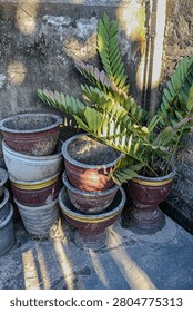 A stack of flowerpots without flowers.