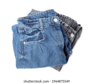 Stack Of Folded Jeans On White Background, Top View