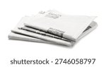 Stack of folded newspapers isolated on white