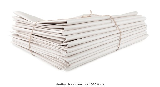Stack of folded newspapers isolated on white
