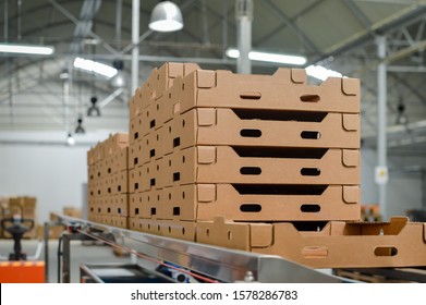 Stack of folded paper box in warehouse