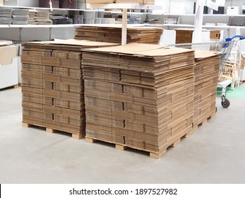 Stack of folded paper box in warehouse or hardware store
