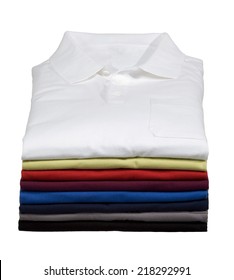 Stack Of Folded Polo Shirts Isolated On White