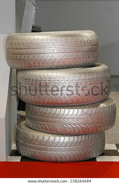 Stack of four car\
tyres for summer season