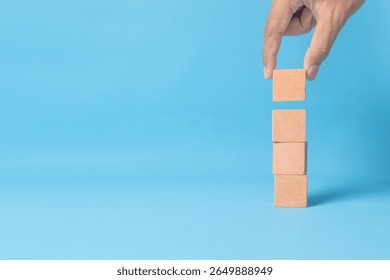 Stack of four empty wooden cubes. Symbolizing foundation, growth, decision making, or creative possibilities.