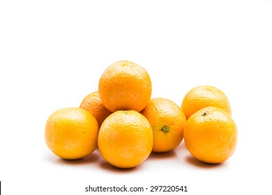 Stack Of Fresh And Juicy Naval Oranges Isolated In White