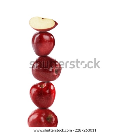 Stack of fresh ripe red apples on white background