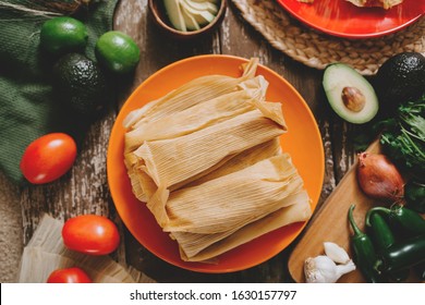 Stack of Fresh Tamales with ingredients and toppings