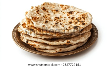 Stack of Freshly Baked Naan Bread on a Brass Plate