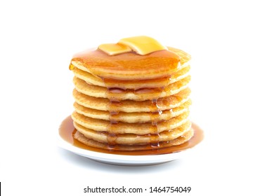 Stack of Freshly Made Buttermilk Pancakes with Syrup and Butter Isoalted on a White Background