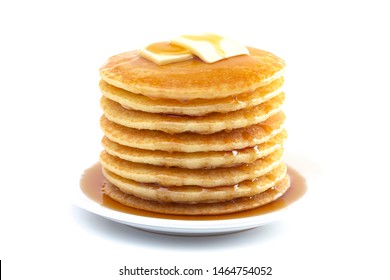 Stack of Freshly Made Buttermilk Pancakes with Syrup and Butter Isoalted on a White Background