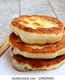 Stack Of Fried Bread On The Table