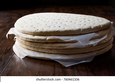 Stack Of Frozen Pizza Base Or Dough