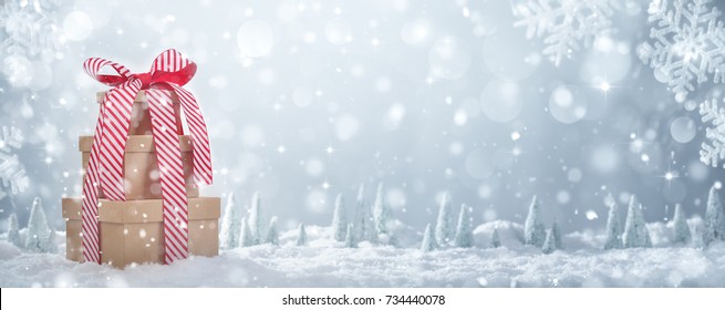Stack of gift box on snow
