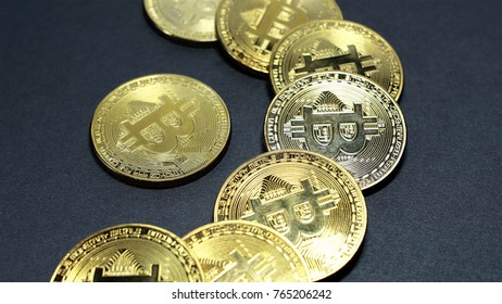 Stack Of Gold Bitcoins On Turntable.