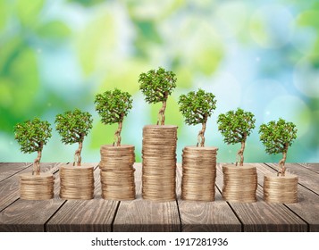 Stack of the golden coin with a tree that grows. The idea of business investment.