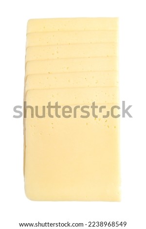 Stack of gouda cheese slices, isolated, from above. Sliced sweet, creamy and yellow cheese, made of cow milk, originated from Gouda in the Netherlands. Close-up, on white background, macro food photo.