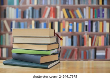 stack of green books onthe table in library, education