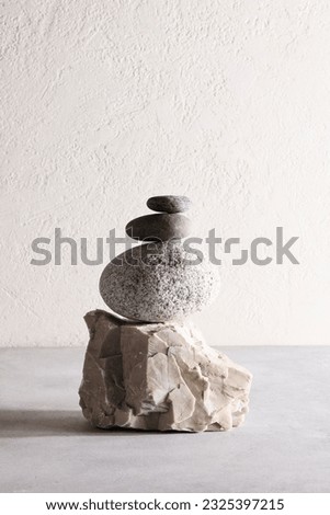 Stack of grey stones. background for product presentation. photo for interior. organic design. calm and relax concept. copy space