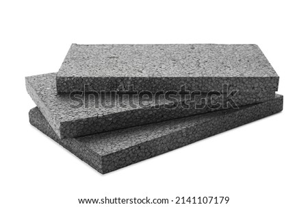 Stack of grey styrofoam sheets on white background