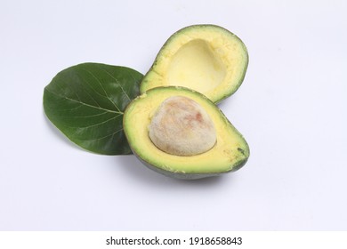 Stack half avocado isolated on white
