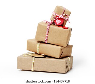 Stack of handcraft gift boxes on white background - Powered by Shutterstock