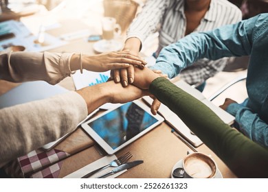 Stack hands, group and business people with success celebrate goal or target. Teamwork, win and workers huddle together for sales results, support or collaboration in startup meeting in cafe closeup - Powered by Shutterstock