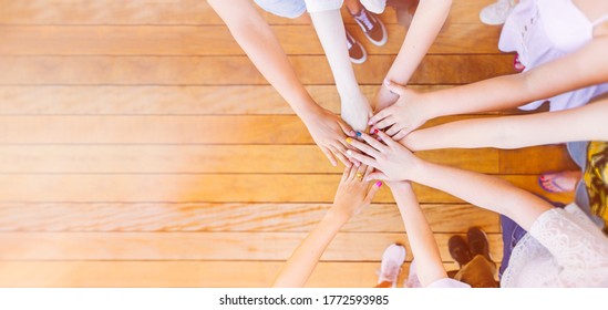 Stack of hands. Unity, teamwork and friendship concept