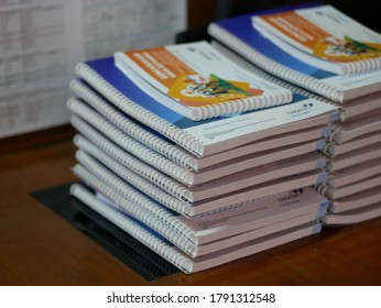 Stack Of Hard Cover Ring Binding Book